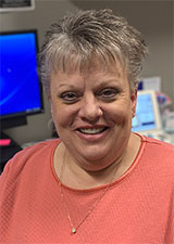 Denise Helle, CPOC